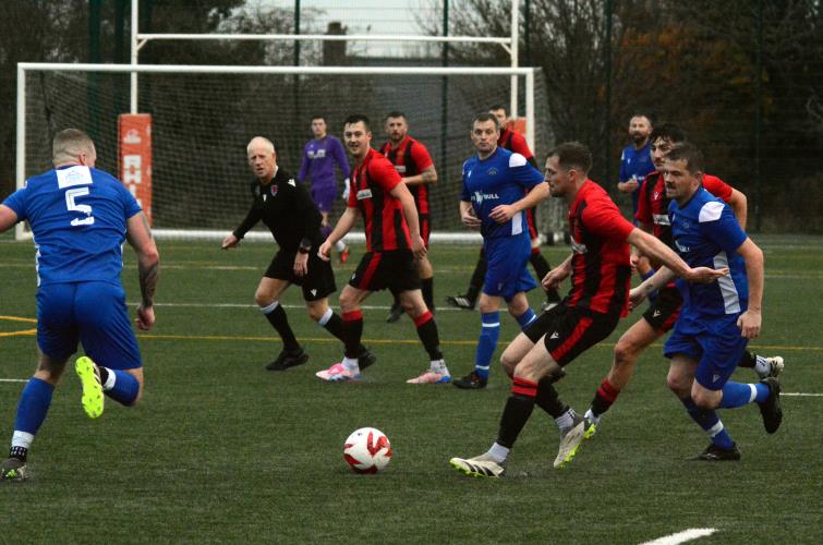 Rhys Dalling - the Goodwick striker is surrounded